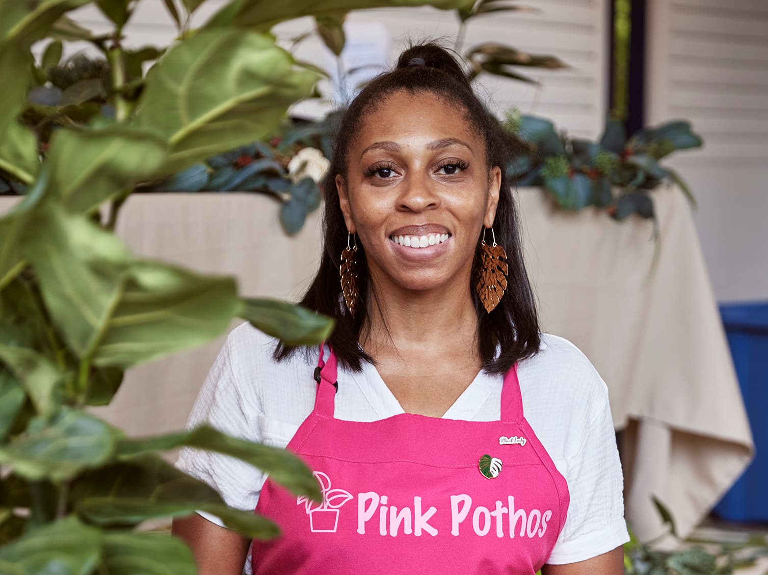 Lakeisha Jones stands in the custom container that housed her business, Pink Pothos, on the Westside Trail. Photo Credit: Erin Sintos.