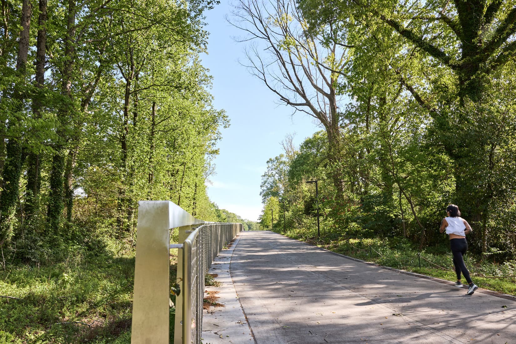 A woman runs on a path.