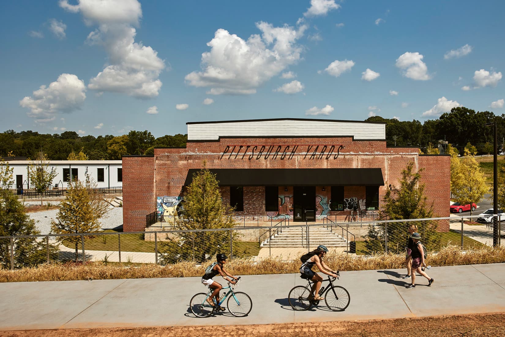 People walk and bike down the Beltline.