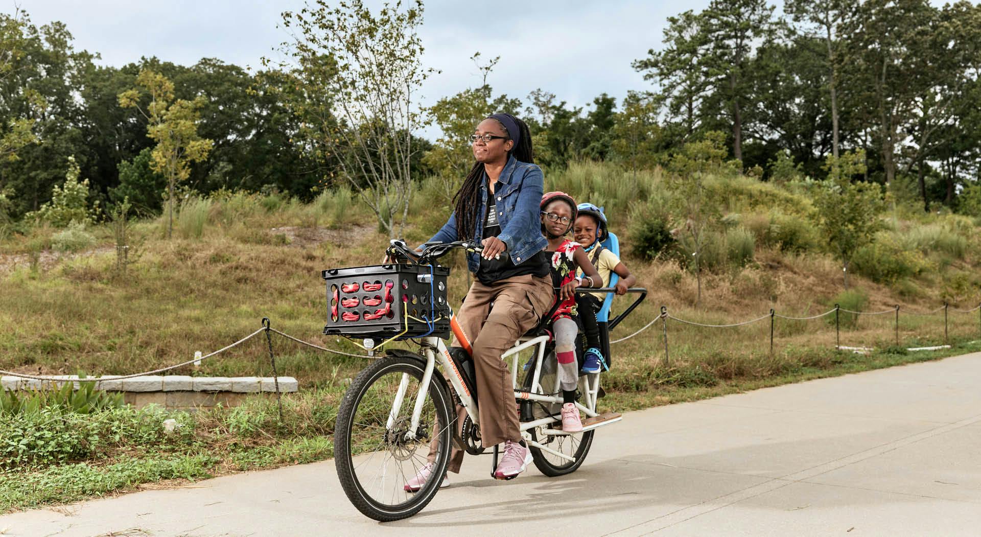 A family commutes on the Atlanta Beltline Southside Trail. (Photo Credit: The Sintoses)