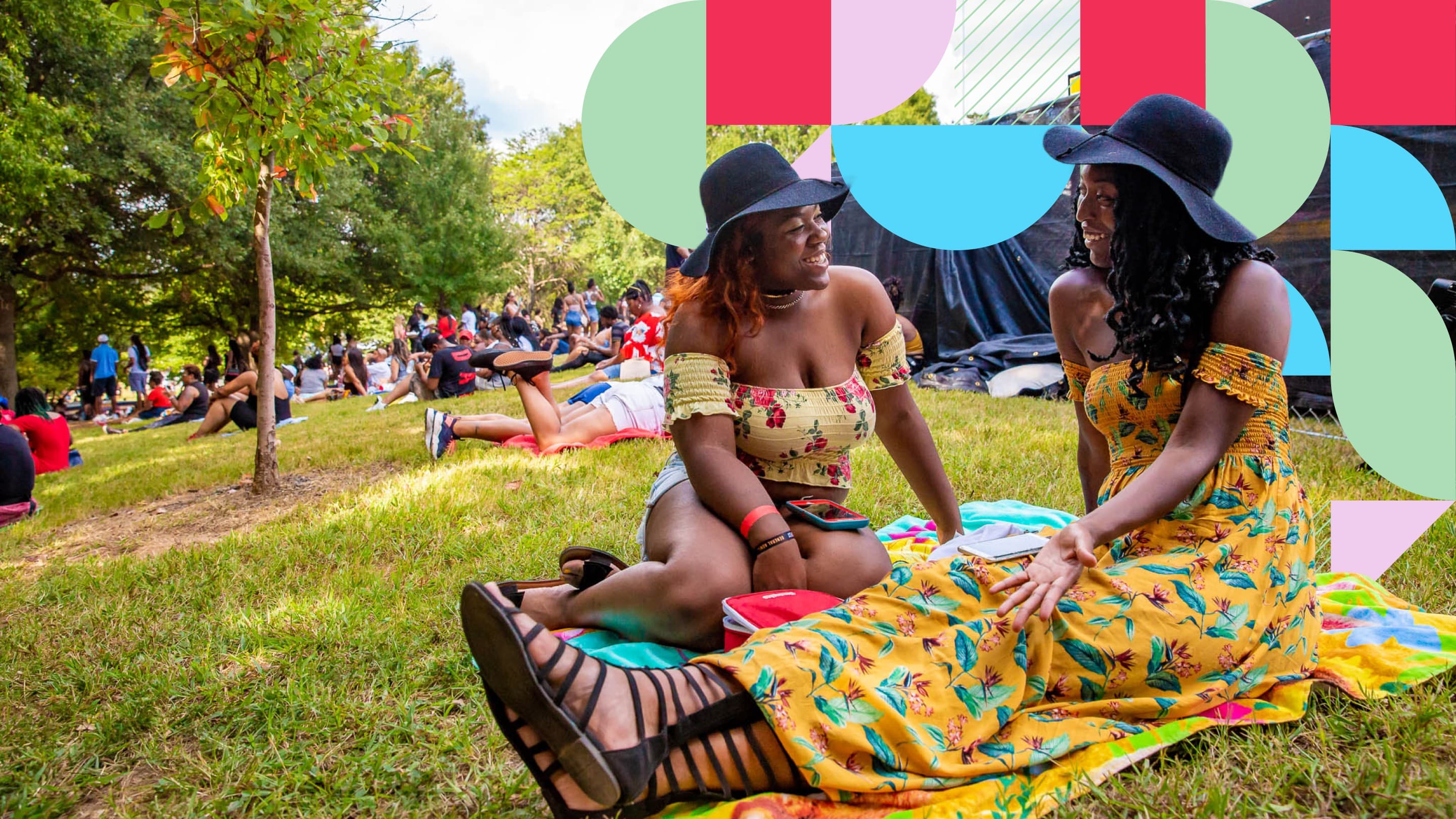 Women sitting on grass outside