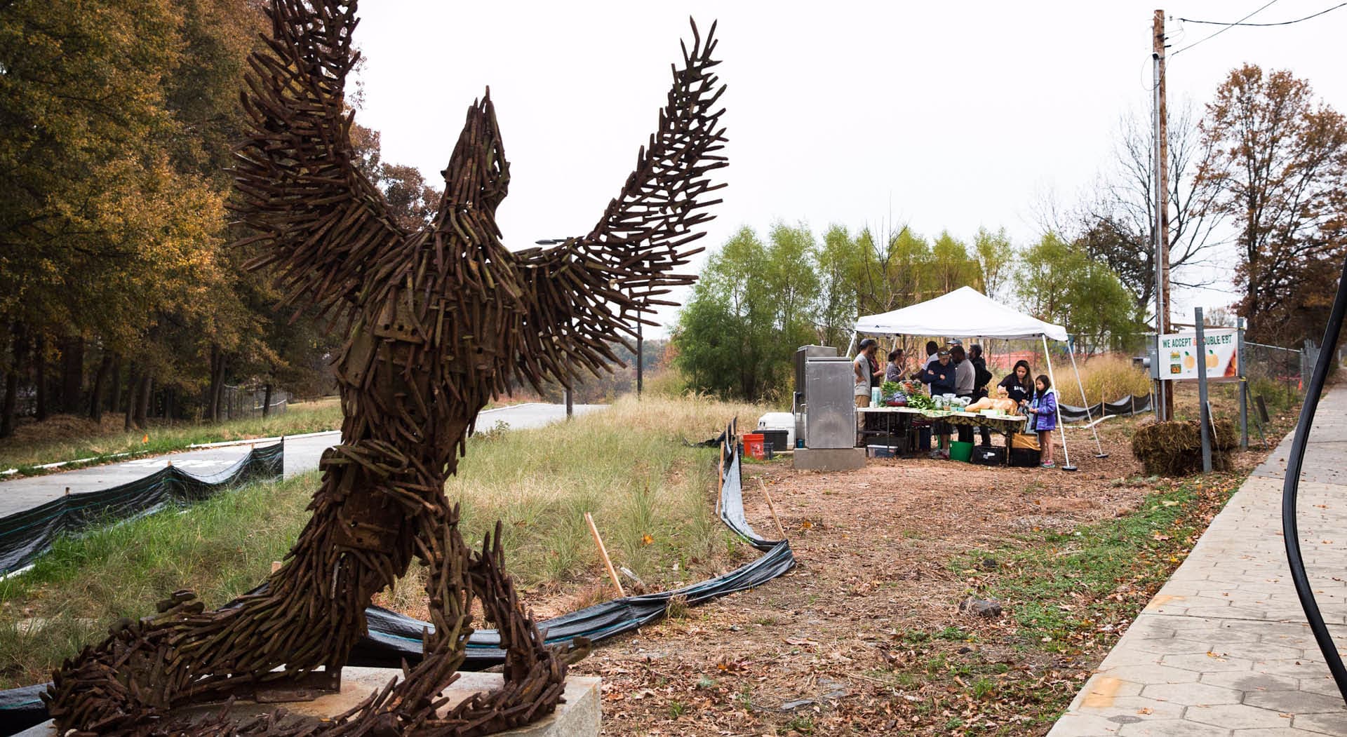 A large sculpture of a phoenix made out of railroad spikes and artifacts by artist Allen Peterson. (Photo Credit: Erin Sintos)