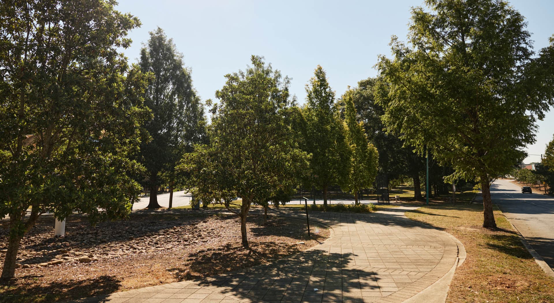Wide paths wind through Rose Circle Park across from the dining destination, Lee + White. (Photo Credit: Erin Sintos)
