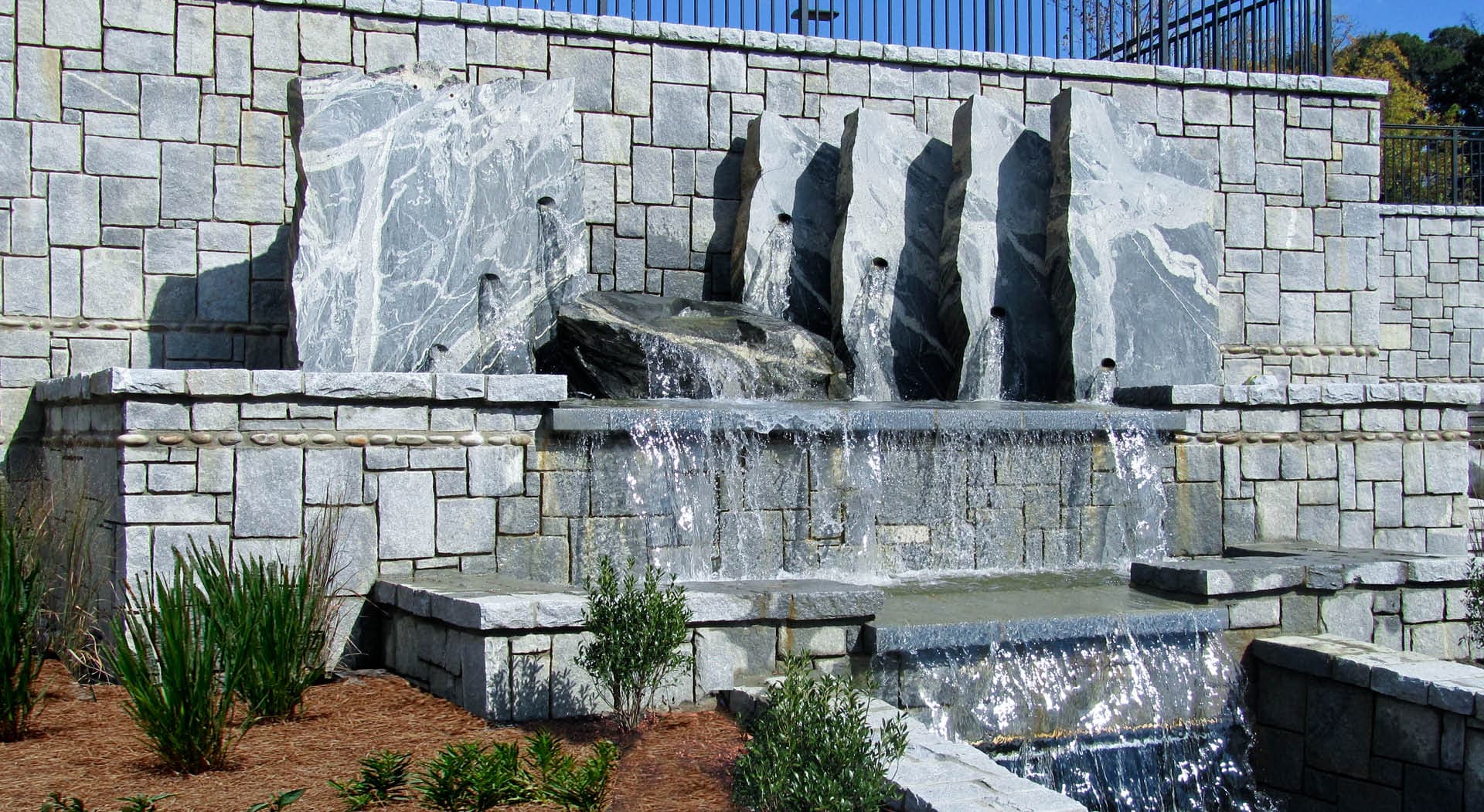 Waterfall sculpture made out of granite slabs.