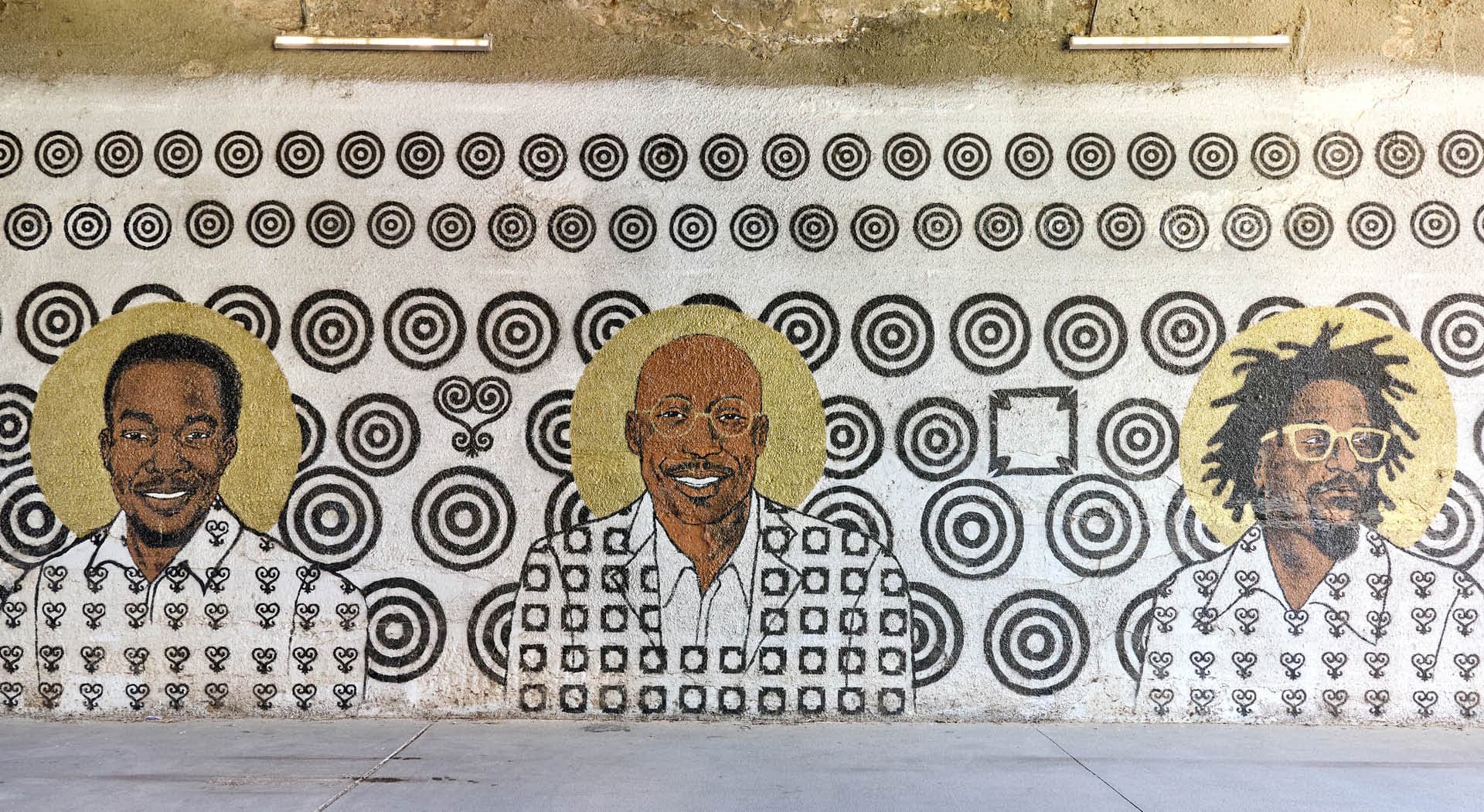Mural titled Storybox painted on the walls of a tunnel and depicting Black figures of Atlanta's Westside communities. (Photo Credit: Erin Sintos)