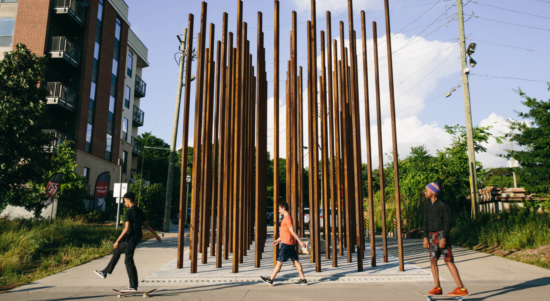 A sculpture made out of tall, thin steel rods arranged to look like trees. (Photo Credit: Erin Sintos)