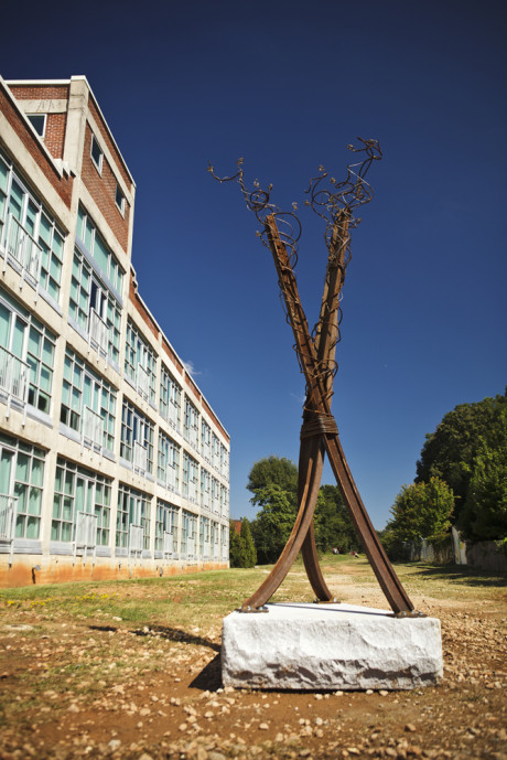 Neil Carver's piece, "Decay #4," is a raw sculpture that displays railroad artifacts in various stages of decay, referencing the return-to-nature of the once abandoned corridor. Photo: Christopher T. Martin