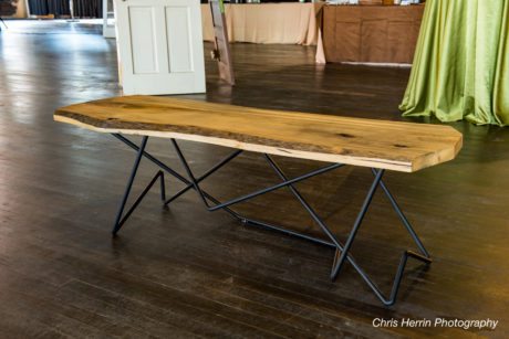 Phil Proctor, a sculptor and Art on the Atlanta BeltLine artist, fabricated this table from a poplar tree that used to live on the Westside Trail.