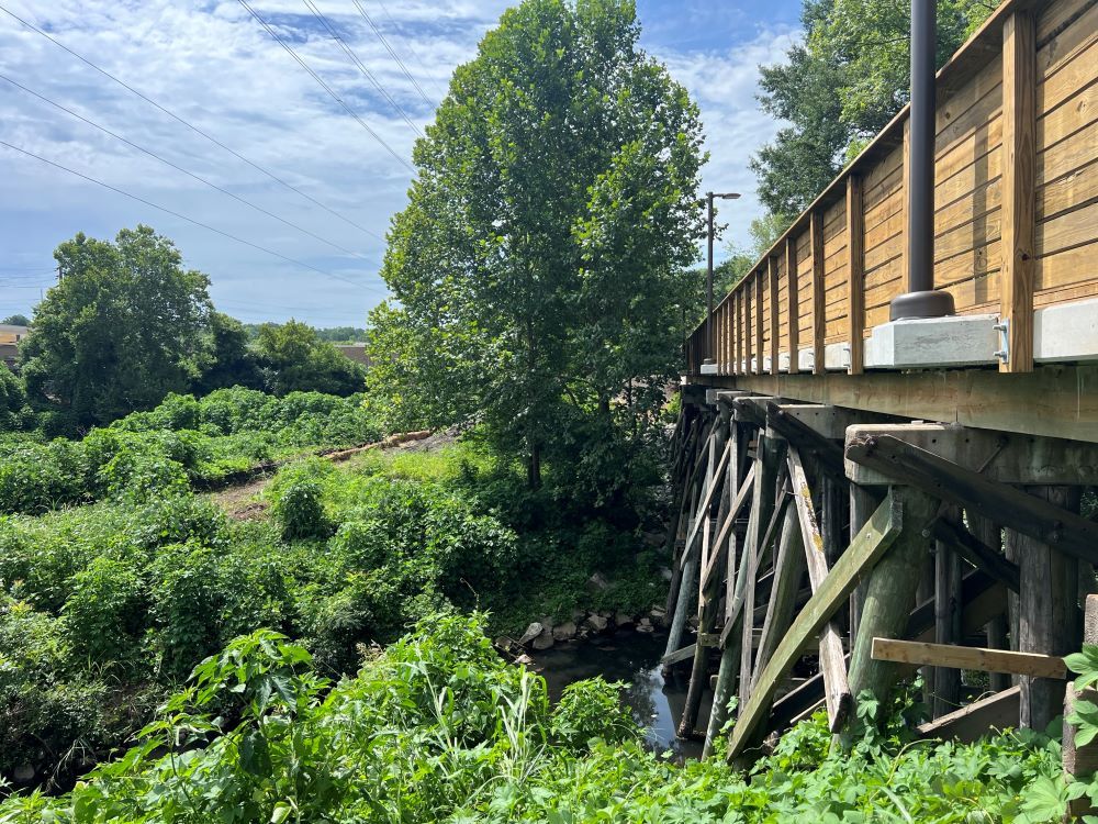 The trestle bridge over Clear Creek behind Ansley Mall. July 21, 2023.