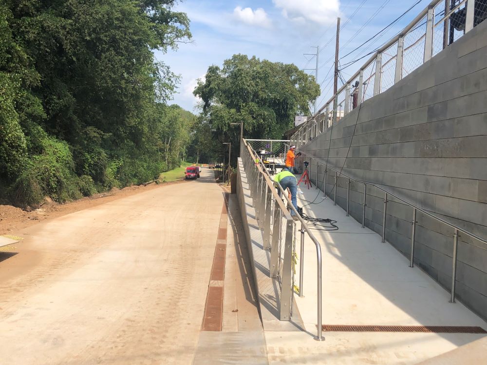 Putting finishes touches on the ramp between Piedmont Avenue and Northeast Trail - Segment 2. September 21, 2023. Photo by Atlanta BeltLine staff.