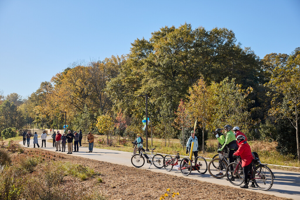 People took to the newly opened trail to join the ribbon cutting for Northeast Trail - Segment 2. Photo by Erin Sintos.