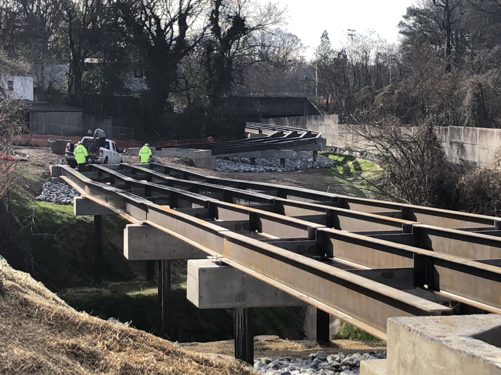 Westside Trail – Segment 4: steel has been installed on the elevated trail section running adjacent to and crossing over MARTA rail. View from Washington Manor Drive NW looking towards Washington Park.