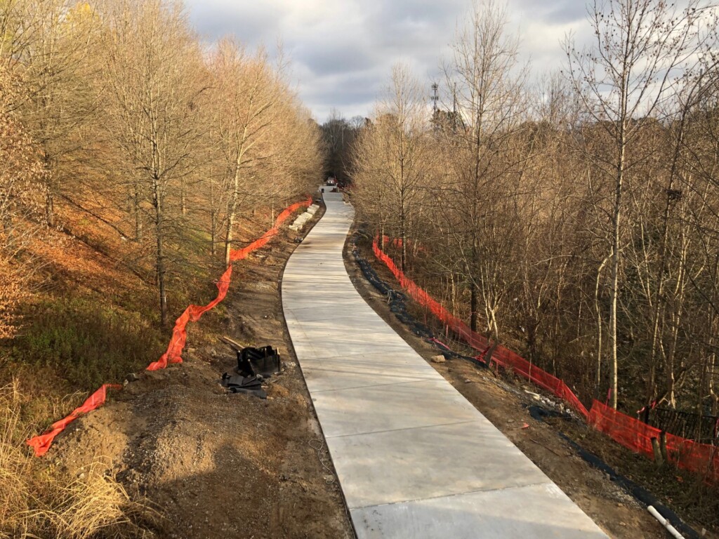 View of newly poured trail from Evelyn Street bridge in Piedmont Park looking north towards Westminster Dr. NE. ABI is working to open this phase of the project early, possibly in February, once lights and cameras are installed and operational. January 24, 2024.