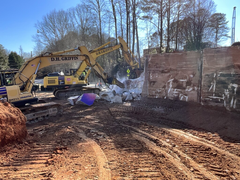 Abutment wall removal at United Avenue. New abutment walls will be constructed to support a new pedestrian bridge as well as future light rail. January 31, 2024.