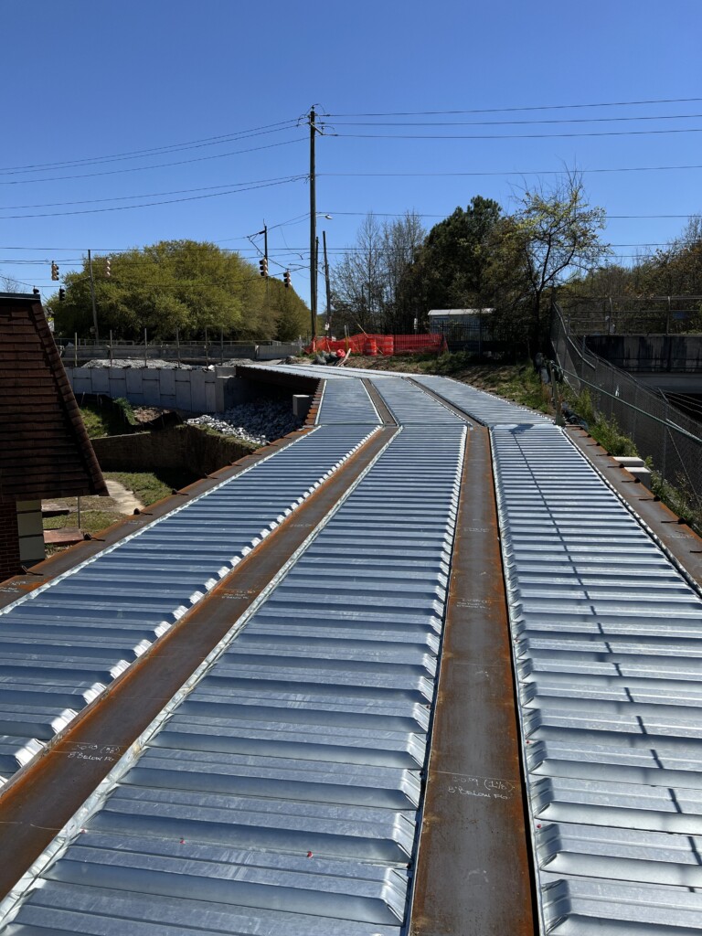 View of elevated trail section, with structural steel and decking complete, facing Joseph E. Boone Blvd NW. Photo taken 03/29/2024. Photo by ABI Staff.