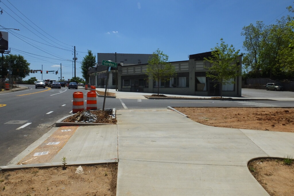 View of the completed sidewalks and tree planting at South Gordon Street SW and Ralph David Abernathy. Photo taken 04/25/2024. Photo by Kerri Parker.