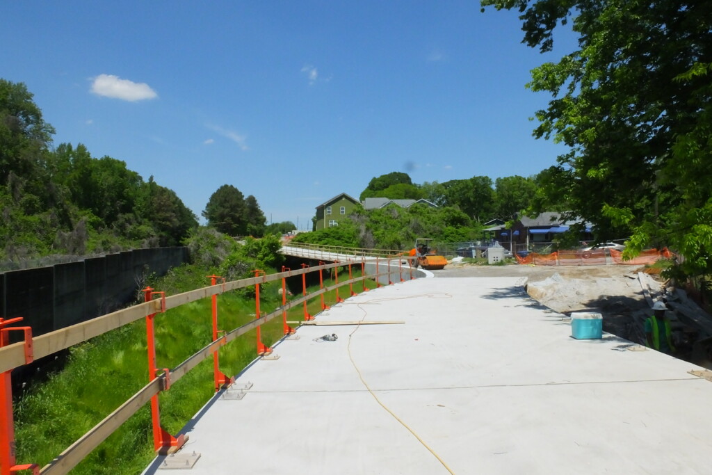 Completed elevated trail, with a section of trail prepped for a slab on grade in the middle, facing Washington Manor Drive N.W. Photo taken 04/25/2024. Photo by Kerri Parker.